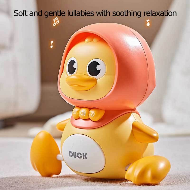 Baby reaching for a waddling magnetic duck toy, promoting early sensory exploration and play.