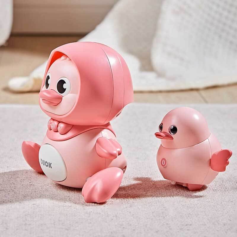 Interactive duck toy in motion, demonstrating its waddling and swinging features for young children.