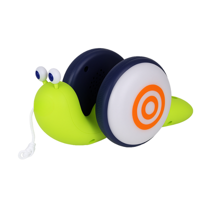 Happy toddler playing with an interactive musical snail toy, suitable for educational learning and fun activity.