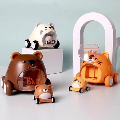 Toddler pushing red animal racer toy, developing motor skills, cognitive development, cause and effect.