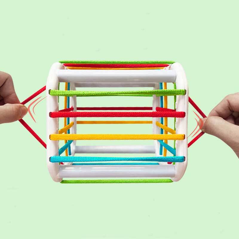 Rainbow sensory block game for toddlers, promoting early development and shape recognition.