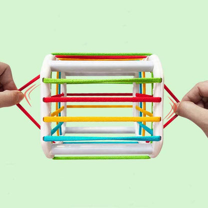 Rainbow sensory block game for toddlers, promoting early development and shape recognition.