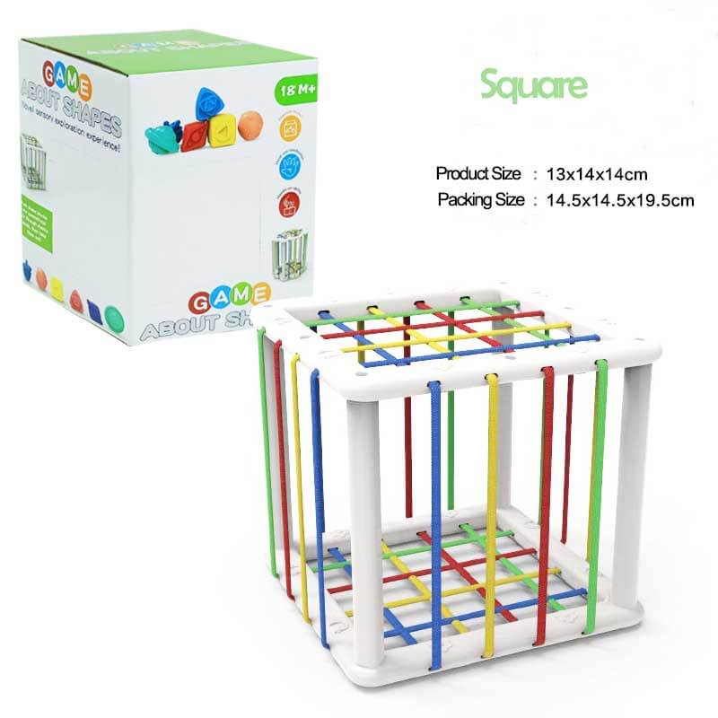 Toddler engaged in sensory play with a rainbow shape sorter. Early development learning game.