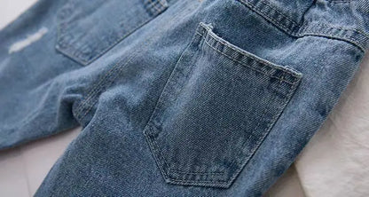 Elastic waist ripped denim jeans, offering comfort & style for young children