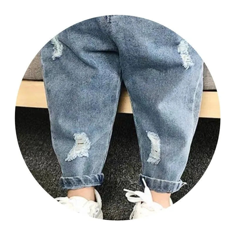 Front view of indigo blue ripped denim jeans for toddlers, casual boys/girls pants