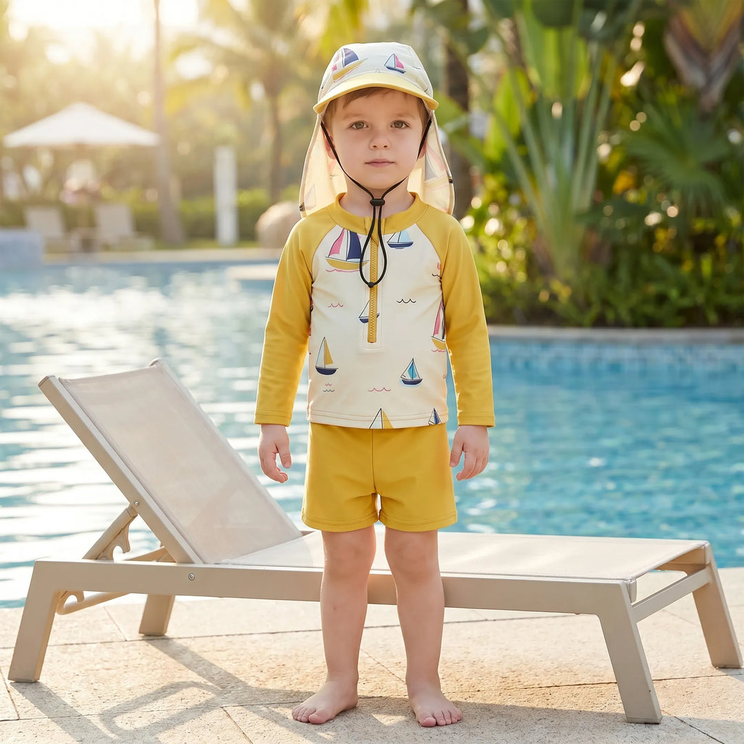 Toddler's 3-piece sun protection swim set: long-sleeve top, matching shorts, and wide-brim hat for beach & pool fun.