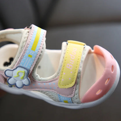 Yellow children's sandals with secure fastenings, great for summer water play