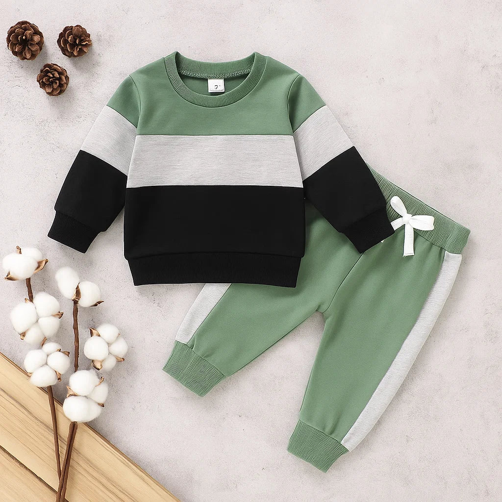 Close-up of the ultra-soft fabric of a toddler's autumn-winter sweatshirt and jogger set.