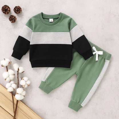 Close-up of the ultra-soft fabric of a toddler's autumn-winter sweatshirt and jogger set.