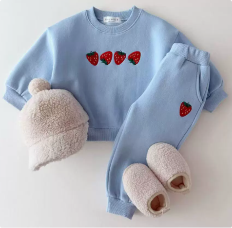 Unisex kids' cotton sweater with vibrant strawberry print, perfect for cozy winter fashion