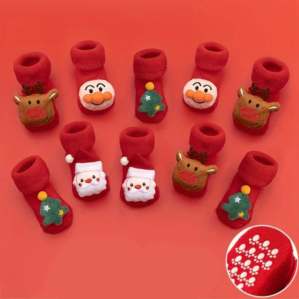Toddler's festive anti-slip Christmas socks, red with white Santa design, for comfortable winter wear.