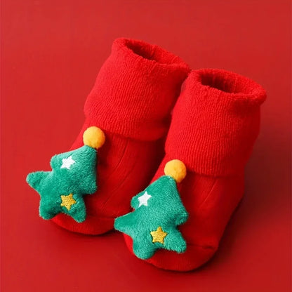 Toddler's plush anti-slip socks with Santa, ensuring warmth and safety on slippery floors.