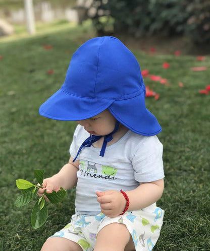 Child reaching for a quick-dry UV protection bucket hat, highlighting ease of use