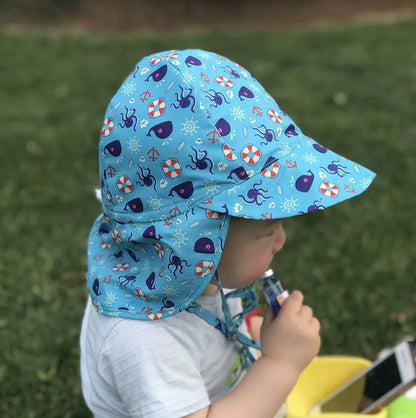 Close-up of adjustable chin strap on a toddler's quick-dry UV protection bucket hat