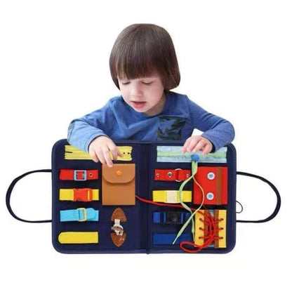 Full view of an interactive busy board for toddlers, packed with developmental learning activities.