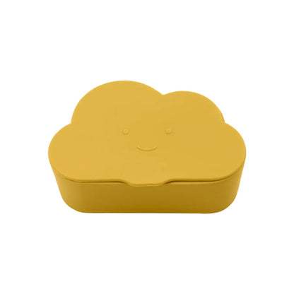 Baby reaching for a red silicone snack cup with a cartoon car lid, BPA-free feeding