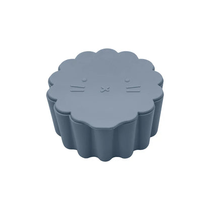 Silicone snack cup in a stroller, showing how it's a convenient, spill-proof baby essential