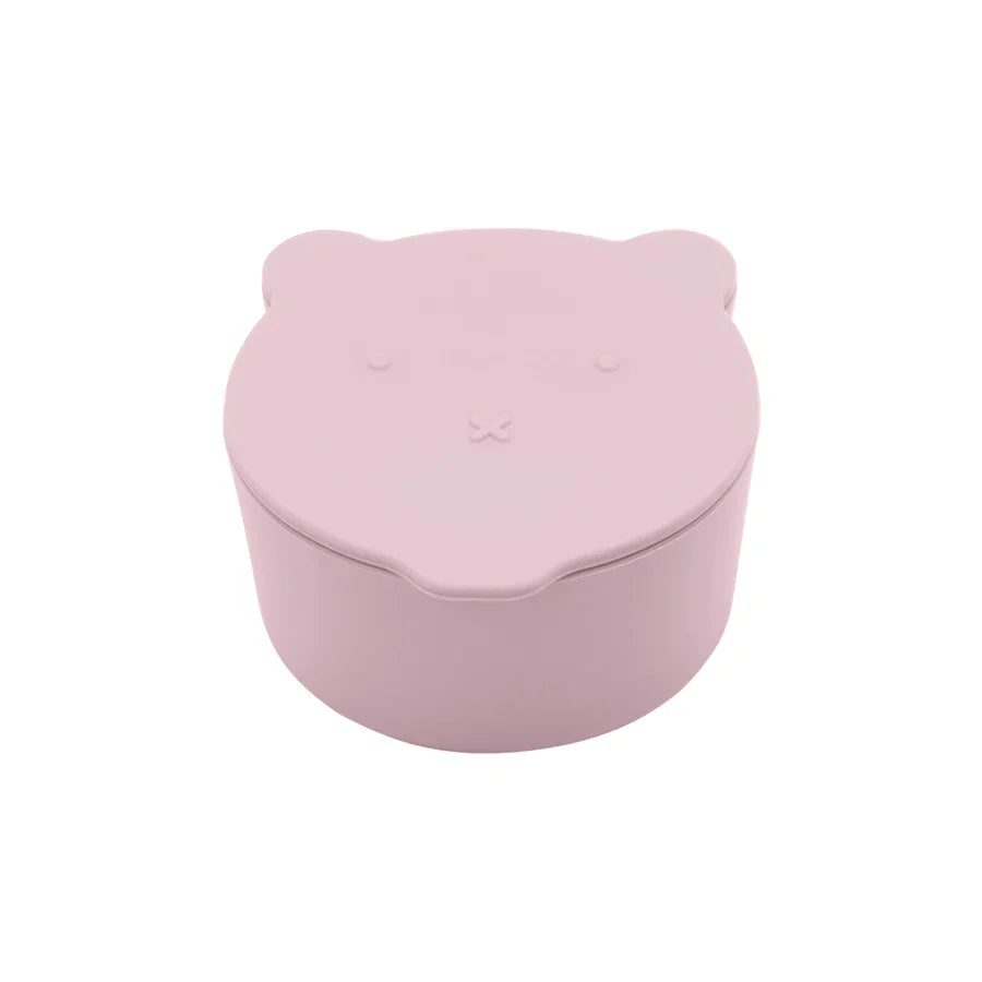 Orange silicone spill-proof snack cup with a friendly cartoon dinosaur lid for toddlers