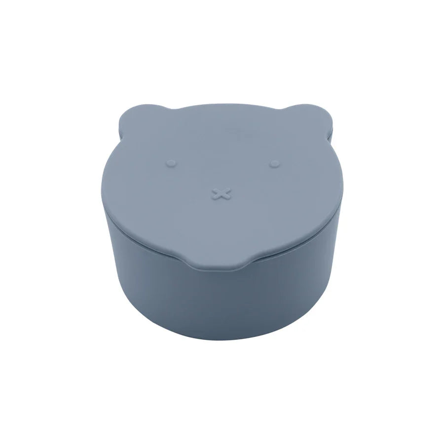 Close-up of the textured grip on a silicone spill-proof snack cup, easy for small hands
