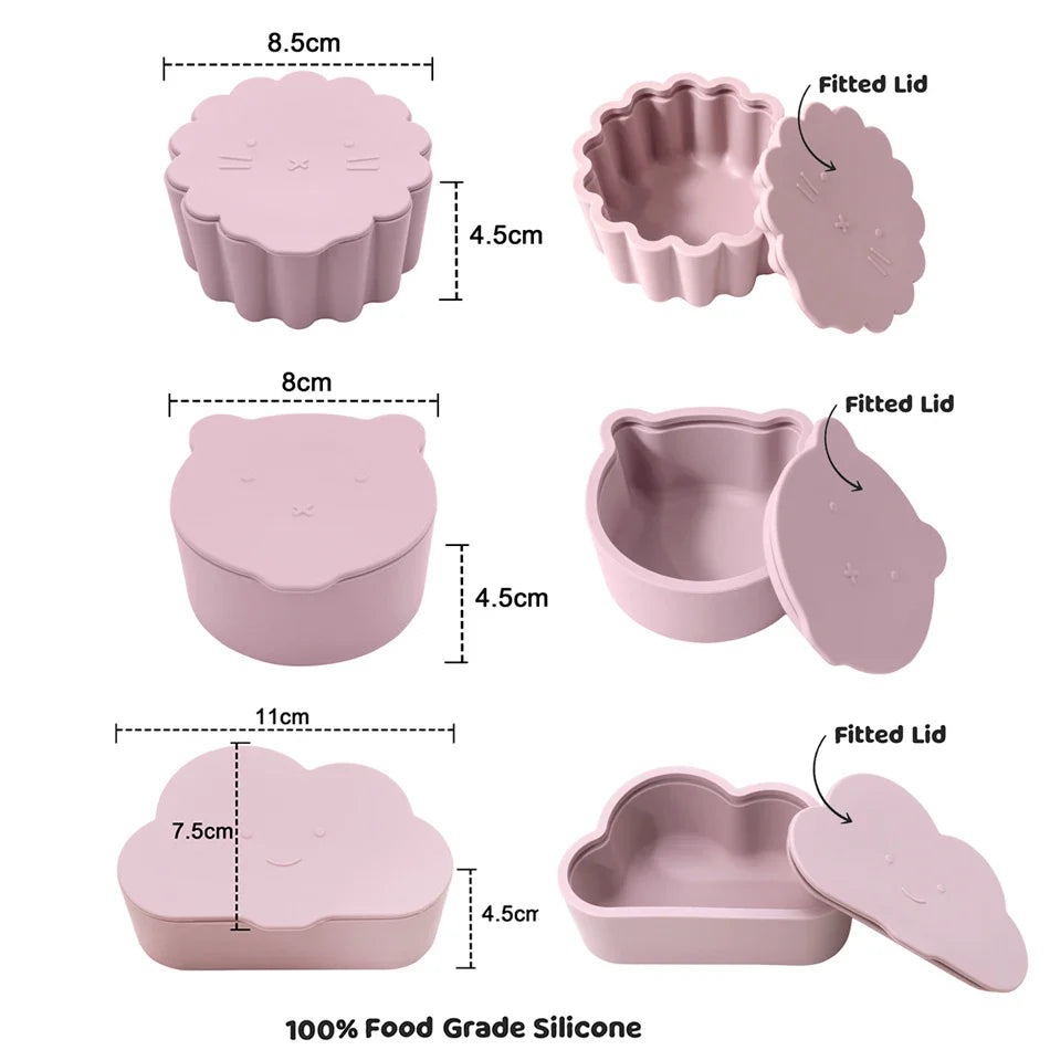 Soft pink silicone snack cup with cartoon bear lid, perfect for spill-proof toddler feeding