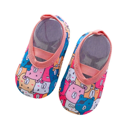 Green slip-on water shoes for children, elastic ankle ensures a snug fit for active toddlers