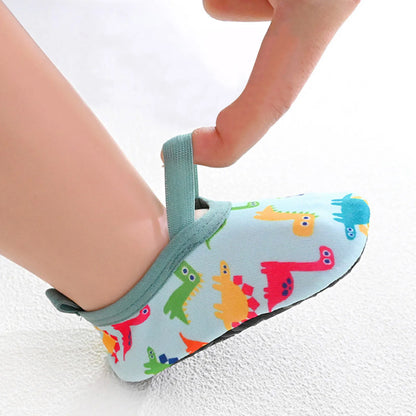 Side view of purple slip-on beach shoes for children, lightweight and flexible for water activities