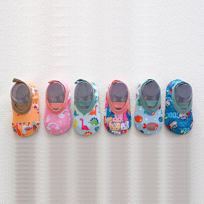 Top-down view of multi-color kids' water shoes, slip-on style for quick and secure fit on toddlers