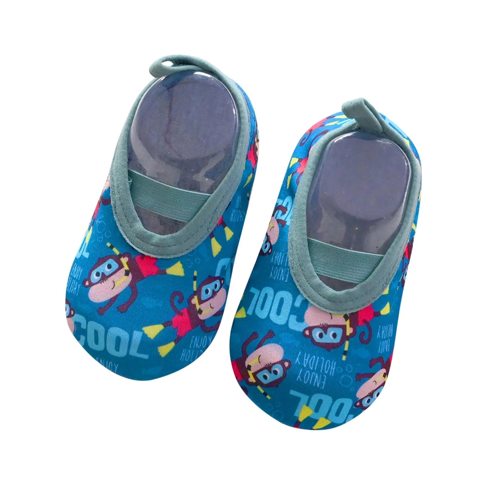 Child actively playing on sand wearing blue slip-on beach water shoes, durable outer sole visible