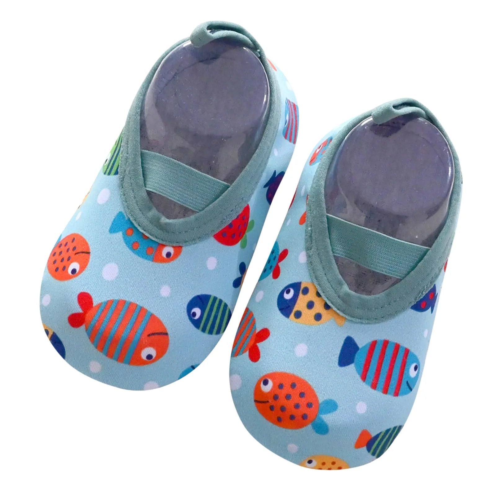 Close-up of the non-slip sole on a pair of pink kids' slip-on water shoes, outdoor safety in mind