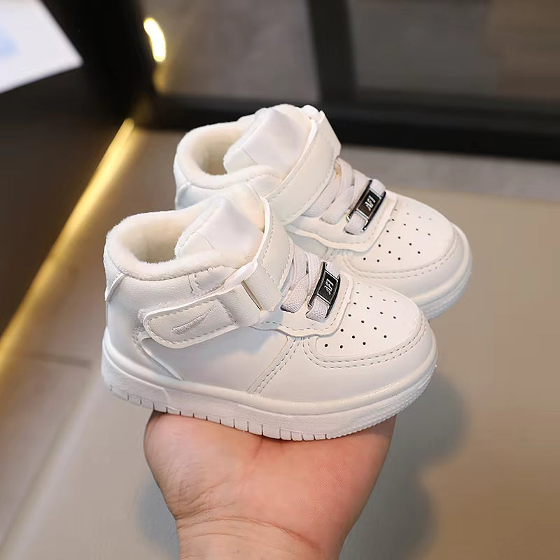 Green toddler sneakers with durable non-slip sole, ensuring stability for active children's feet