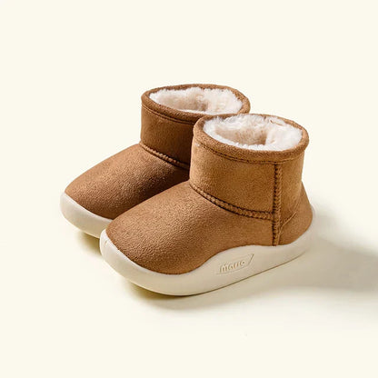 Pair of children's warm winter boots, brown suede, designed for easy wear with zipper closure