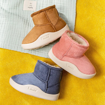 Warm toddler boots featuring a rugged non-slip sole and side zipper, perfect for winter play