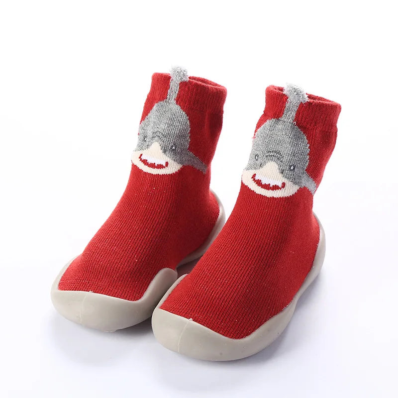 Yellow knitted soft sole anti-slip shoes for toddlers, bright and comfortable firstwalker footwear.