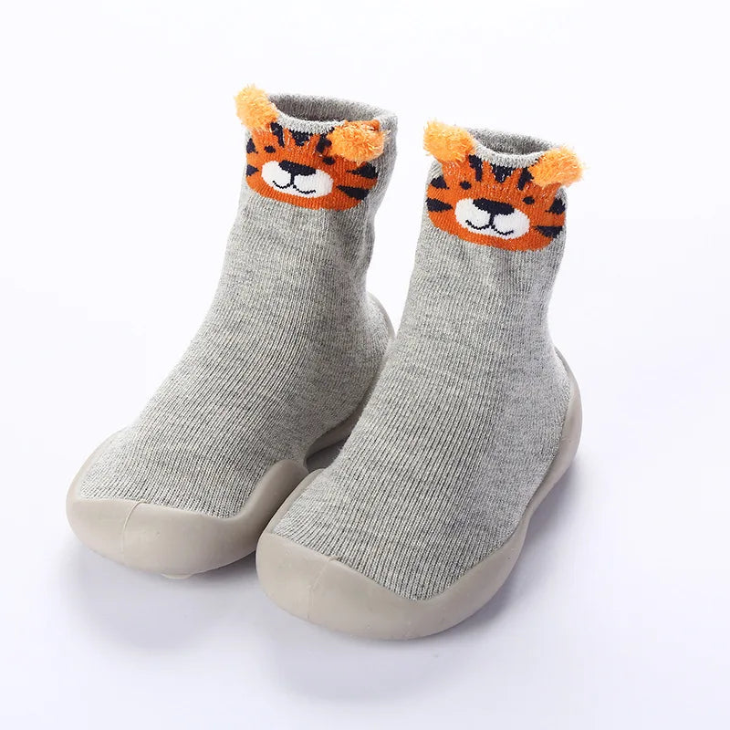 Soft sole anti-slip knitted baby shoes, perfect for toddlers taking their first steps indoors, unisex.