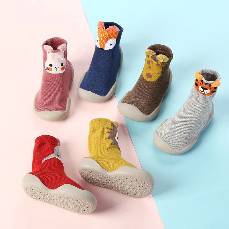 Green anti-slip soft sole baby shoes, knitted design for toddlers, perfect for indoor walking and comfort.