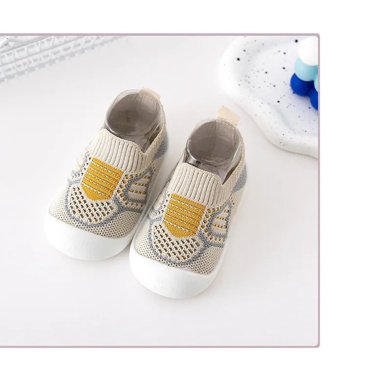 Toddler soft sole shoes in a neutral color, perfect for both spring and fall, great for first steps.
