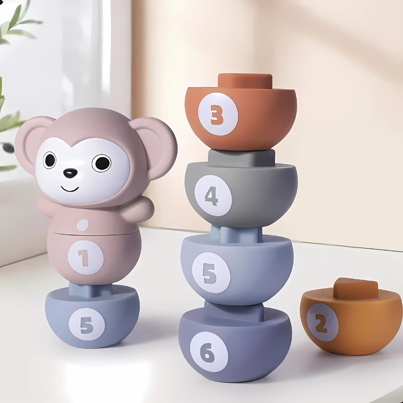 Toddler soft stacking animal bowling game set with colorful animal pins and ball, promoting sensory play.