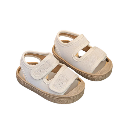 Close-up of a non-slip sole on soft toddler velcro sandals, ideal first walking shoes for kids