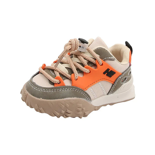 Toddler sport shoes with velcro straps for active play, ensuring a secure fit for children's footwear.