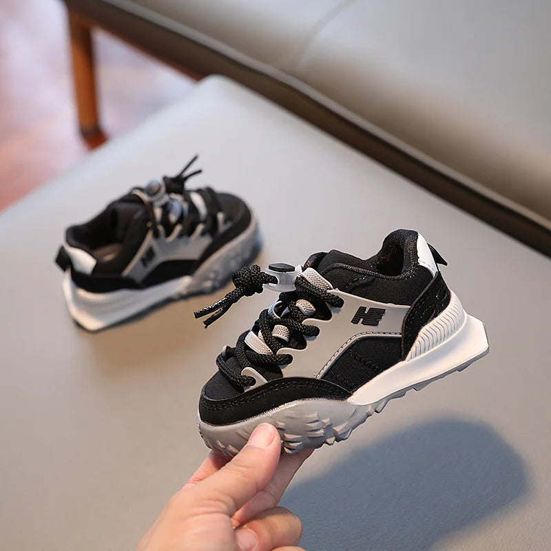 Durable children's sport shoes designed for active play, with non-slip sole and breathable fabric.