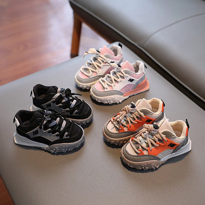 Side view of children's play shoes, showcasing the comfortable design and robust construction for active kids.