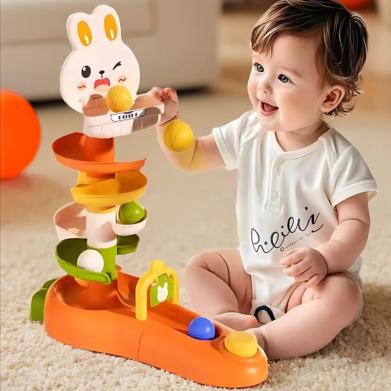 Toddler stacking ball drop tower with colorful spinning ramps, enhancing motor skills & sensory play.