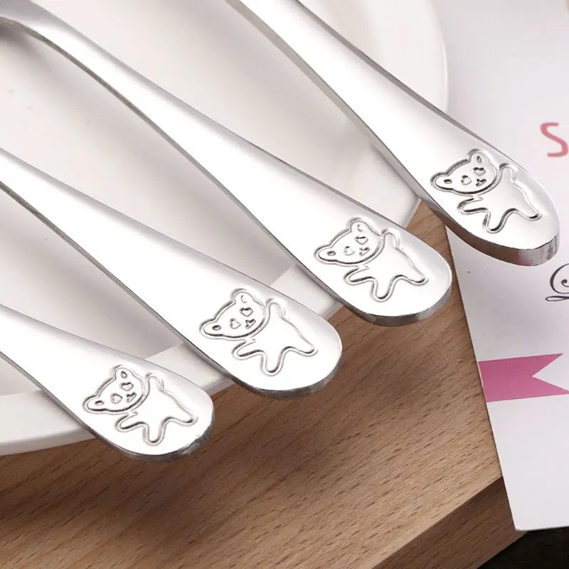 Weaning tools: 4-piece stainless steel cutlery set for toddlers, safe for daily use.