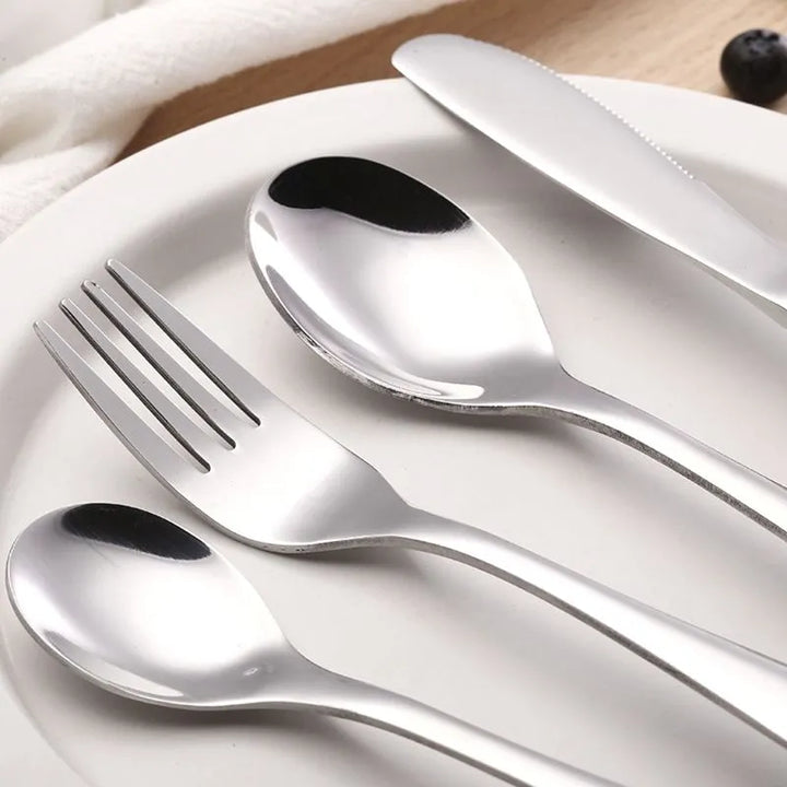 BPA-free stainless steel utensil set for toddlers with rounded edges for child safety.