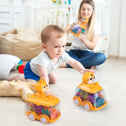 Close-up of toddler's hand playing with transparent inertia toy car, highlighting internal gears