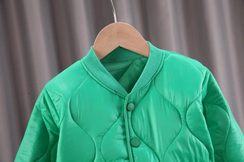 Side profile of a toddler winter jacket with a V-neck, showcasing its comfortable fit