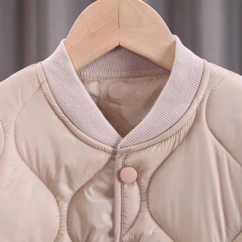 Back view of a plain cotton V-neck toddler jacket, durable and warm baby outerwear
