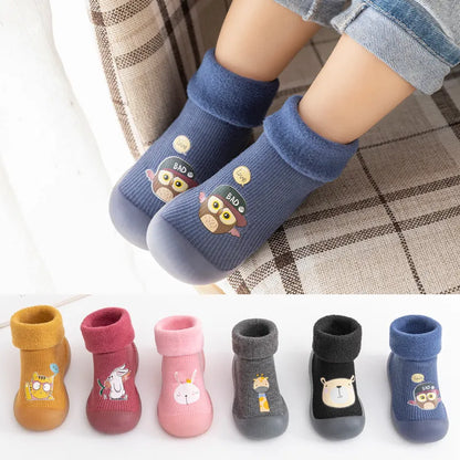 Close-up of unisex toddler velvet socks, soft autumn winter baby apparel