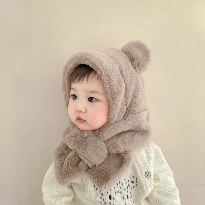 Warm faux fur toddler hat and scarf in rich brown, designed to protect little ones from winter chill