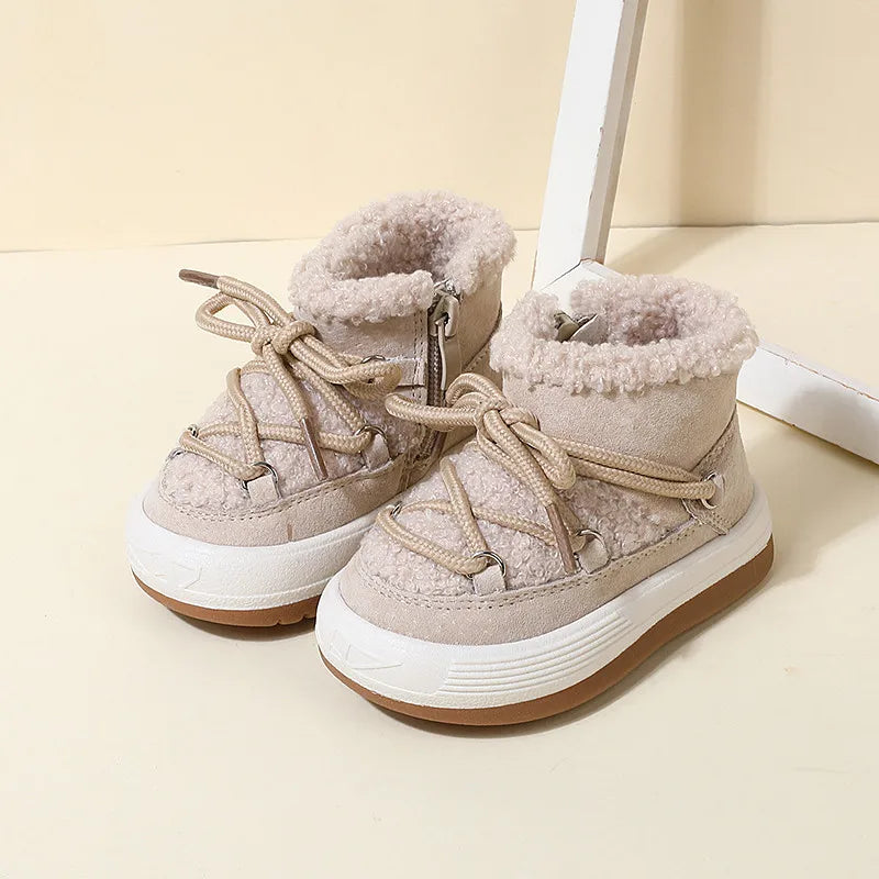 Close-up of non-slip sole on kids' warm winter boots, faux fur lined, toddler size